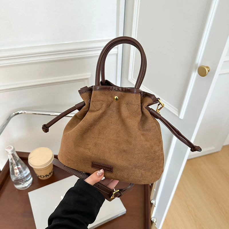 

Fashion New Faux Suede Shoulder Bags String Sewing Thread 2026 Large Capacity Commute Stylish Design Women's Crossbody Bags
