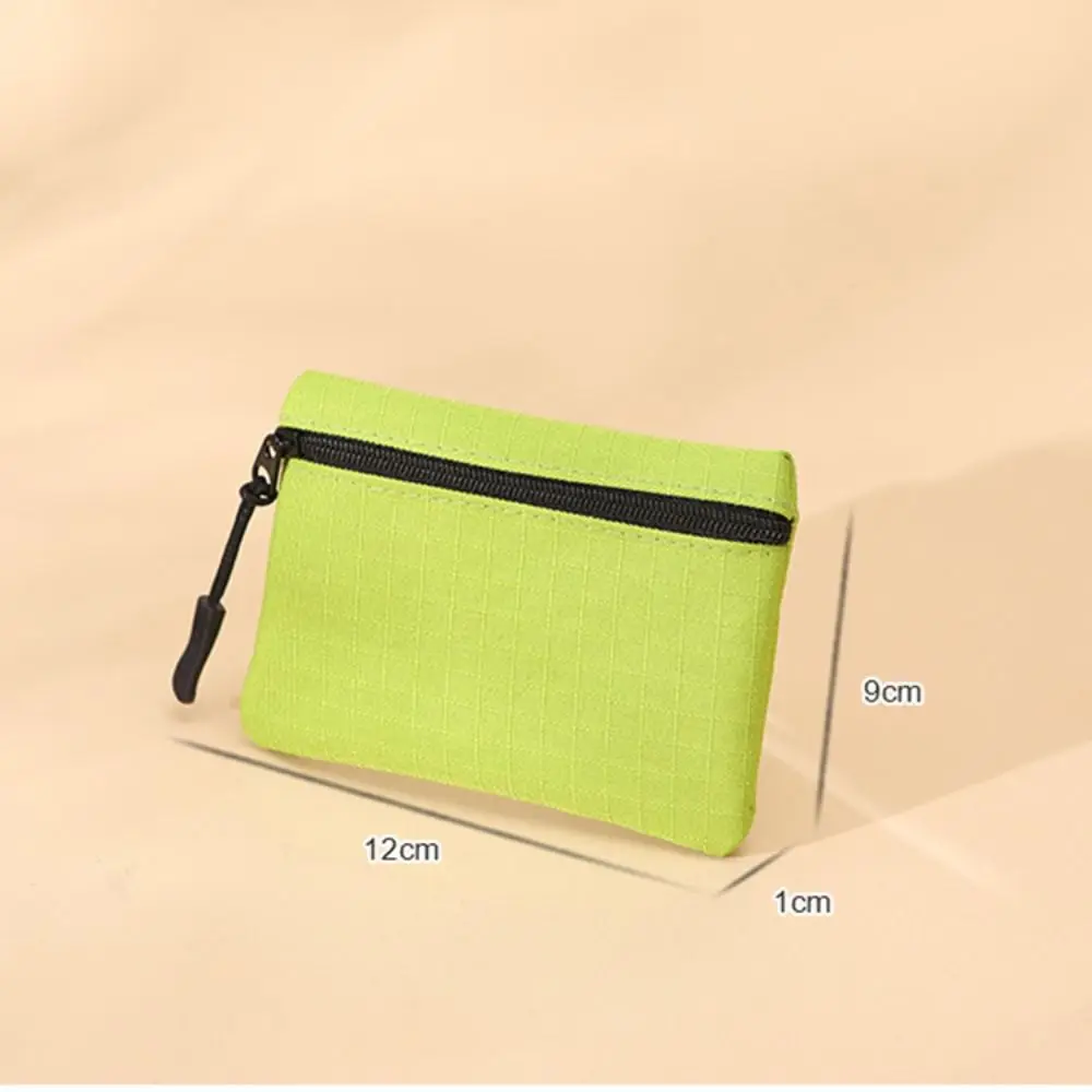 Mini monedero Simple de Color sólido para hombres y mujeres, bolsa de almacenamiento de lona para niños, bolsa para llaves de monedas, billetera pequeña con cremallera