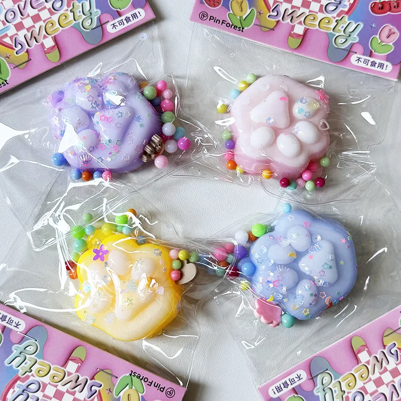 Dropshipping juguete antiestrés Mini juguetes blandos Kawaii felpa suave pata de gato cubo de silicona transparente alivio del estrés juguete para apretar