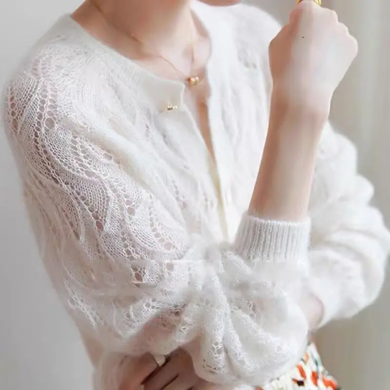 

French Chic White Knit Cardigan Elegant Women's Openwork Summer Top with Unique Buttons Lightweight Office Wear