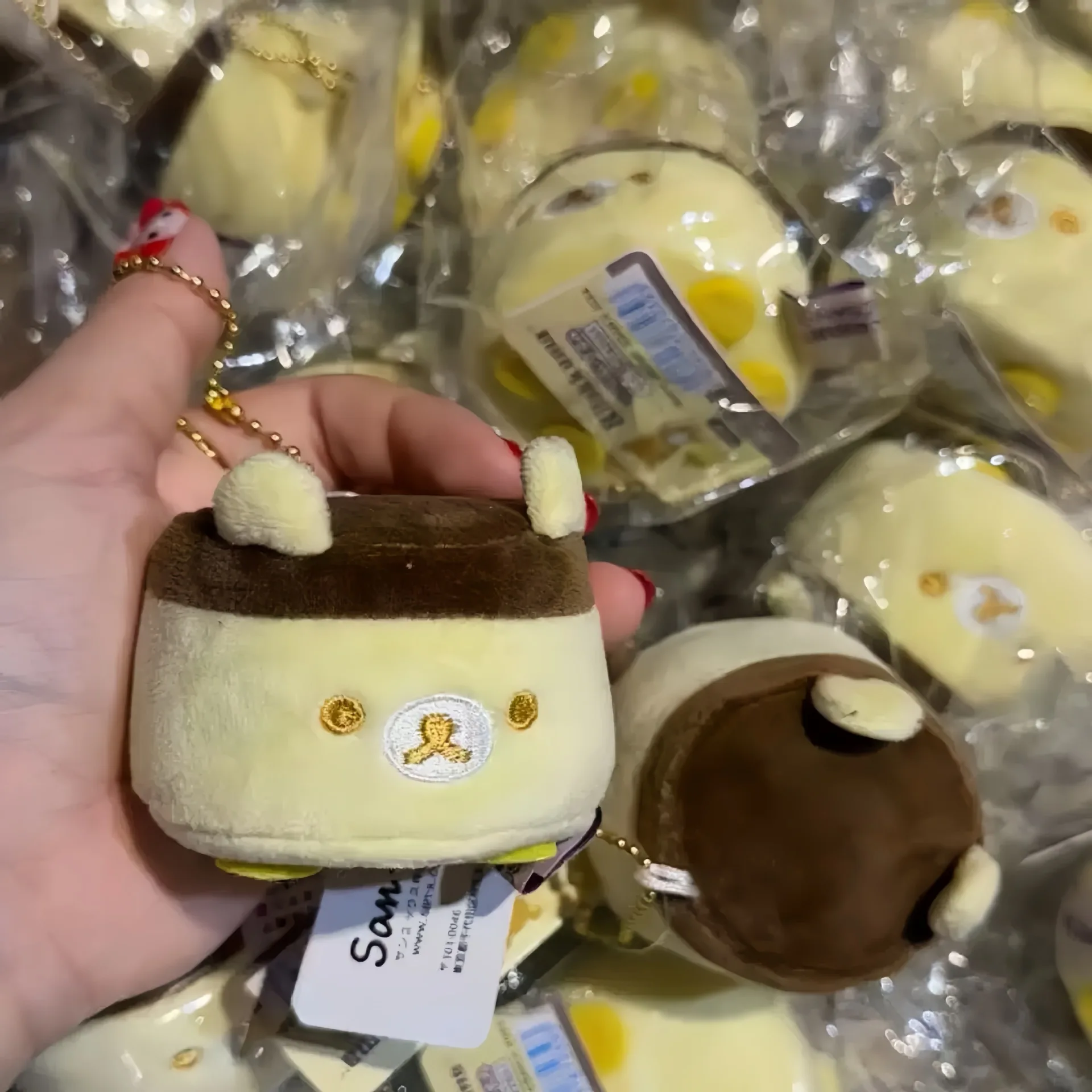 Colgante de felpa de gelatina con pudín para bolso escolar, adorno colgante, llavero de muñeco de nicho, colgante de pudín de oso Rilakkumas, regalo para mujer