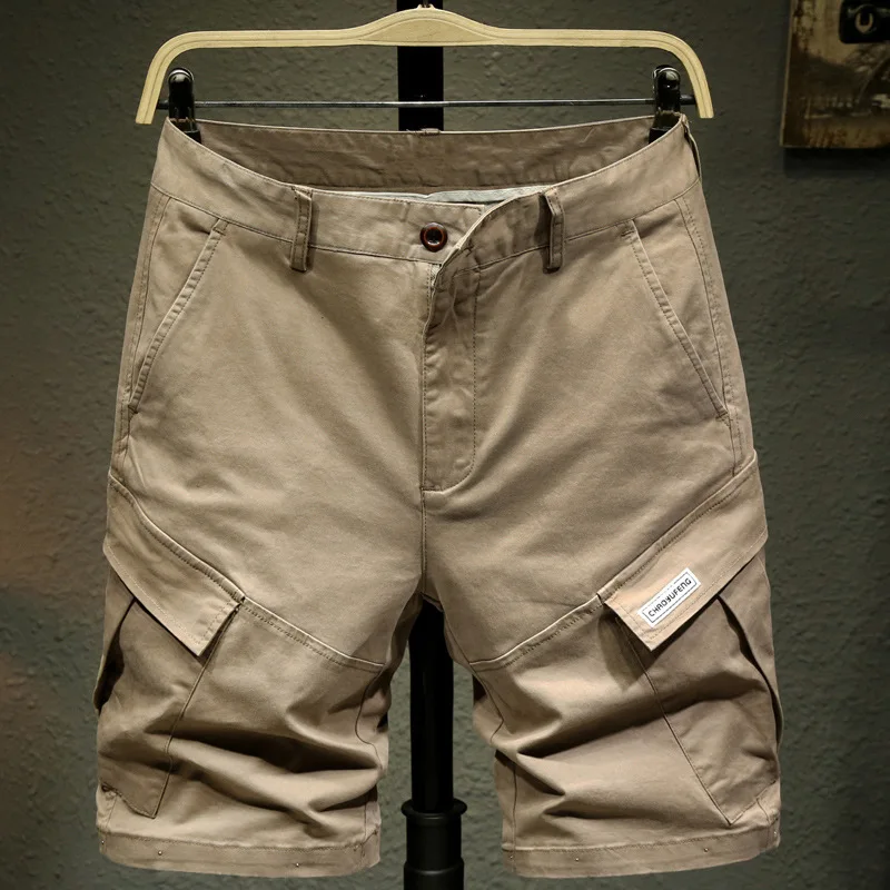 новые хлопковые эластичные рабочие брюки с несколькими карманами для мужчин, свободные прямые брюки, универсальные для молодежи, деловые и повседневные тонкие шорты.
