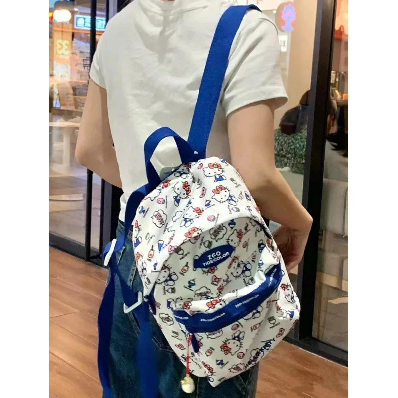 

Детский рюкзак Hello Kitty, новая легкая школьная сумка с героями мультфильмов для девочек, холщовые сумки большой вместимости для женщин, путешествий