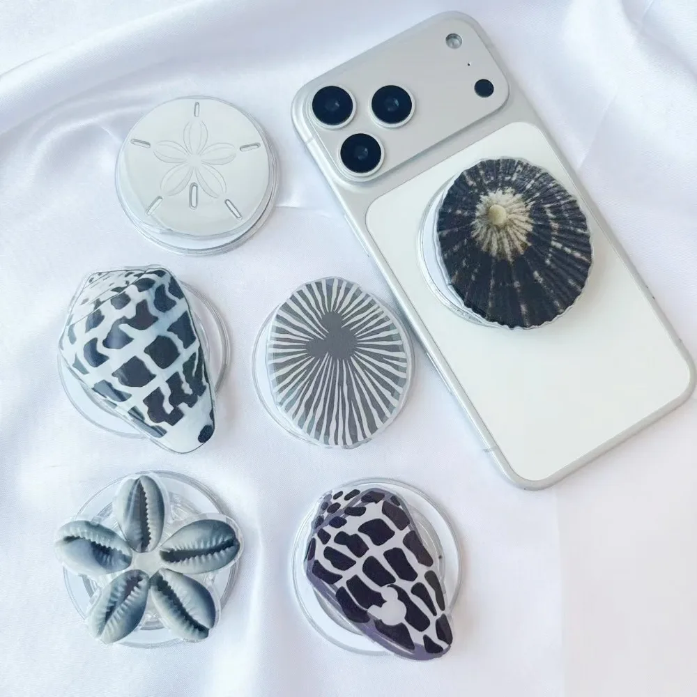 

Irregular-shaped Acrylic Creative Conch Shell Phone Stand Magnetic Suction Airbag Telescopic Detachable Grip Tok Holder Bracket