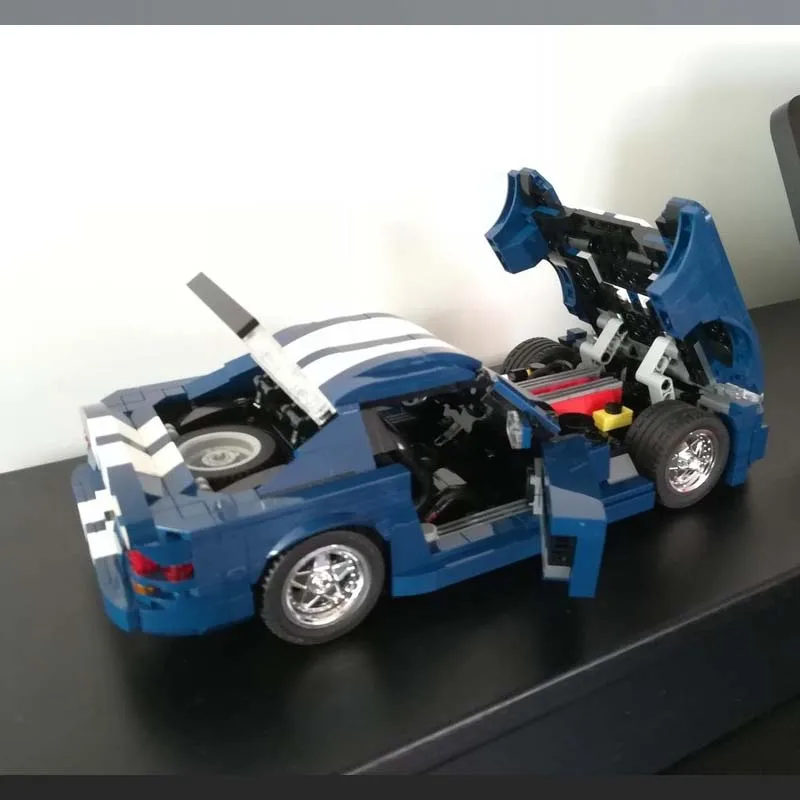 1215 stks Film Supercar GTS Blauw Rood Dubbele Versie Montage Stiksels Bouwsteen Model Kinderen Verjaardag Speelgoed Cadeau