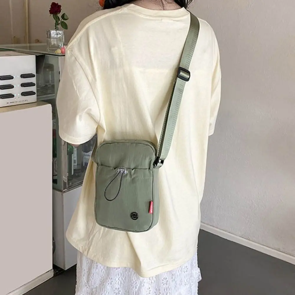 

Solid Color Drawstring Crossbody Bag Waterproof Nylon Nylon Shoulder Bag Korean style Large Opening Mobile Phone Bag Student