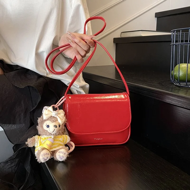 

Casual And Simple Women Shoulder Bag In Soft Faux Leather With Front Pocket For Easy Access To Phone And Essentials