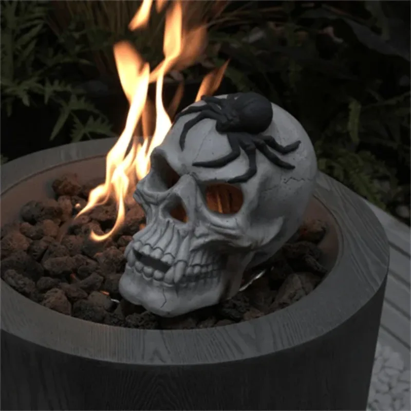 Halloween Decoration metal human skull gas log is meticulously crafted to create a realistic and spooky effect.