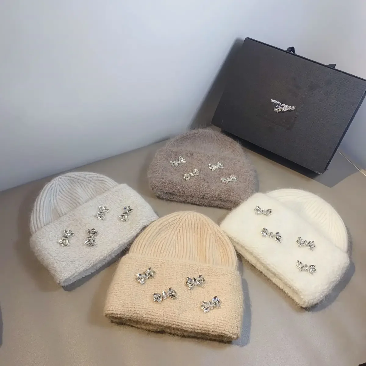 Female light luxury girl style rhinestone thickened wool sheathing hat new winter Nordic outdoor warm knitted ear protection hat