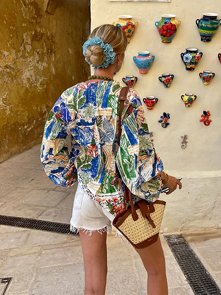 Blusa holgada de manga larga con estampado Floral para mujer, camisa elegante con cordones para playa, informal, a la moda