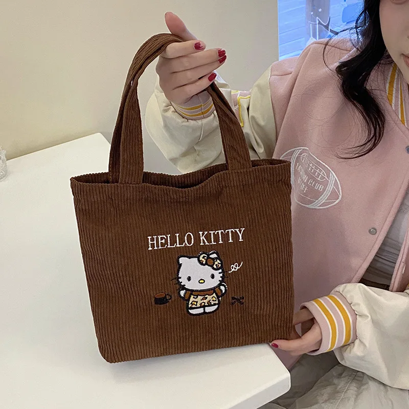 

Sanrio HelloKitty Handbag Cartoon Embroidery Corduroy Large Capacity Students School Single Shoulder Bag Commute bag Gifts