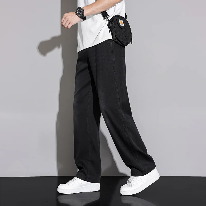 Jeans in denim dritto allentato Lyocell sottile da uomo 2025 Pantaloni casual traspiranti comodi in vita elasticizzata autunno estate Plus Size 38