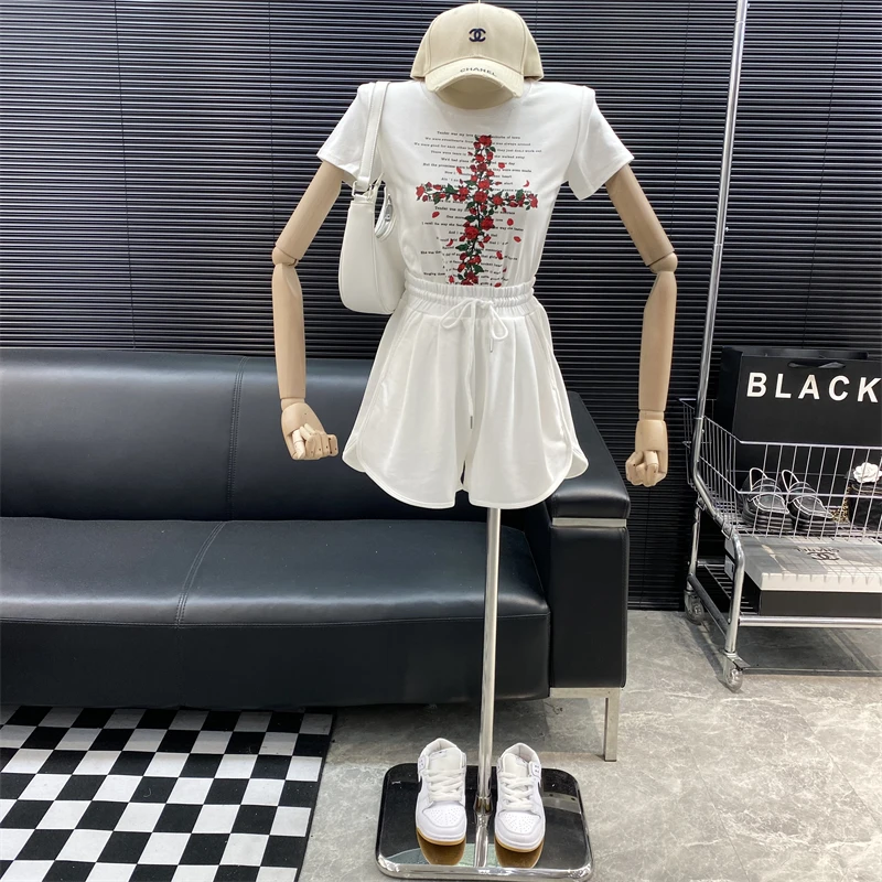 

New 2022 fashion Designer new style Famous brand cross rose Exposed navel Top summer Round neck Versatile Casual Letter T-shirt