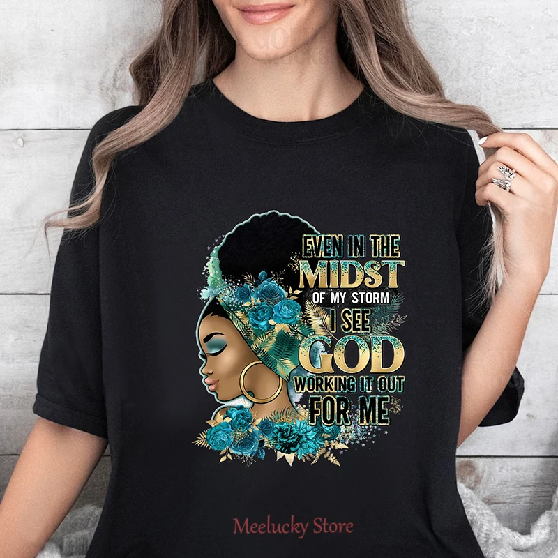 even in the midst of my storm i see god working it out for me Round neck T-shirt, printed pattern women's top