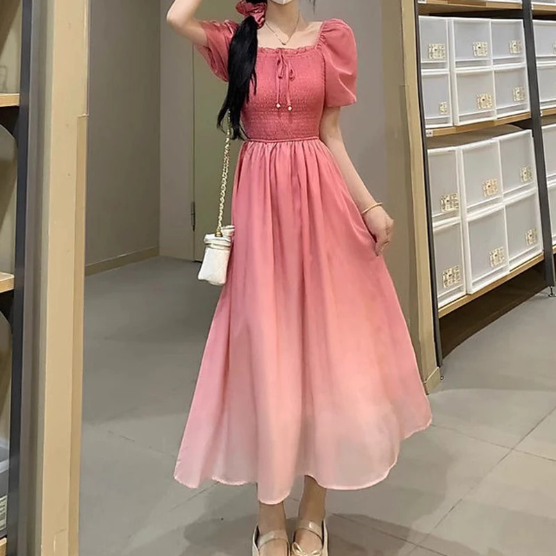 

French gentle wind pink pleated gradient dress women's summer 2024 new loose waist cover belly slim long skirt.