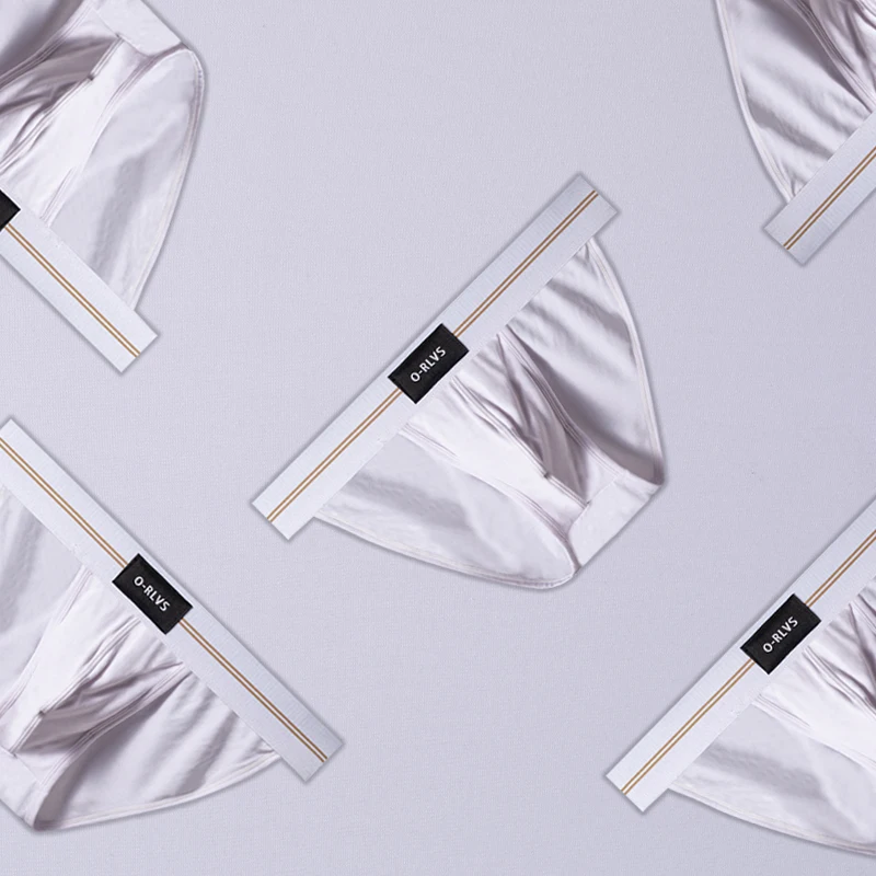 

Ice silk Transparent Underwear Stitching Large U Pouch Men's Briefs Sexy Low Waist Convex Underpants Man Sports Panties