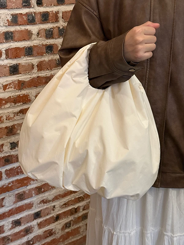 

Korean Ins Folding Handheld Pumpkin Bag for Women 2025 New Large Capacity Commuter Handbag Cloud Bags