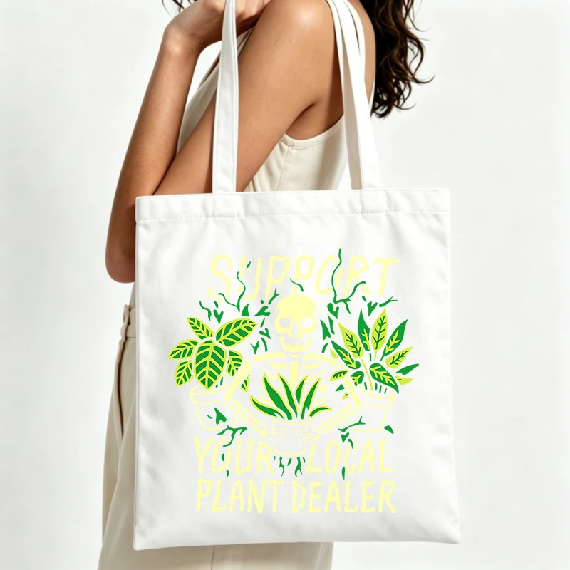 skeleton and plant graphic canvas tote bag with slogan print, ideal for casual daily use and shopping outings