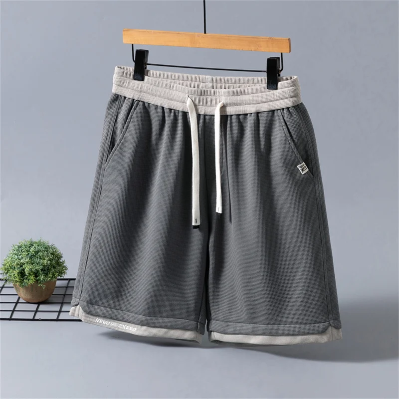 Ice silk shorts for men in summer, ultra-thin outerwear, quick drying basketball sports shorts, summer new casual five quarter p