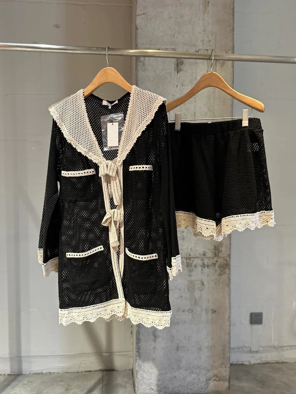 

Heidd Early Spring 2026 Knitted Long Shirt And Shorts Set Hollow out Large Collar Two Piece Women's Fashion Ensemble