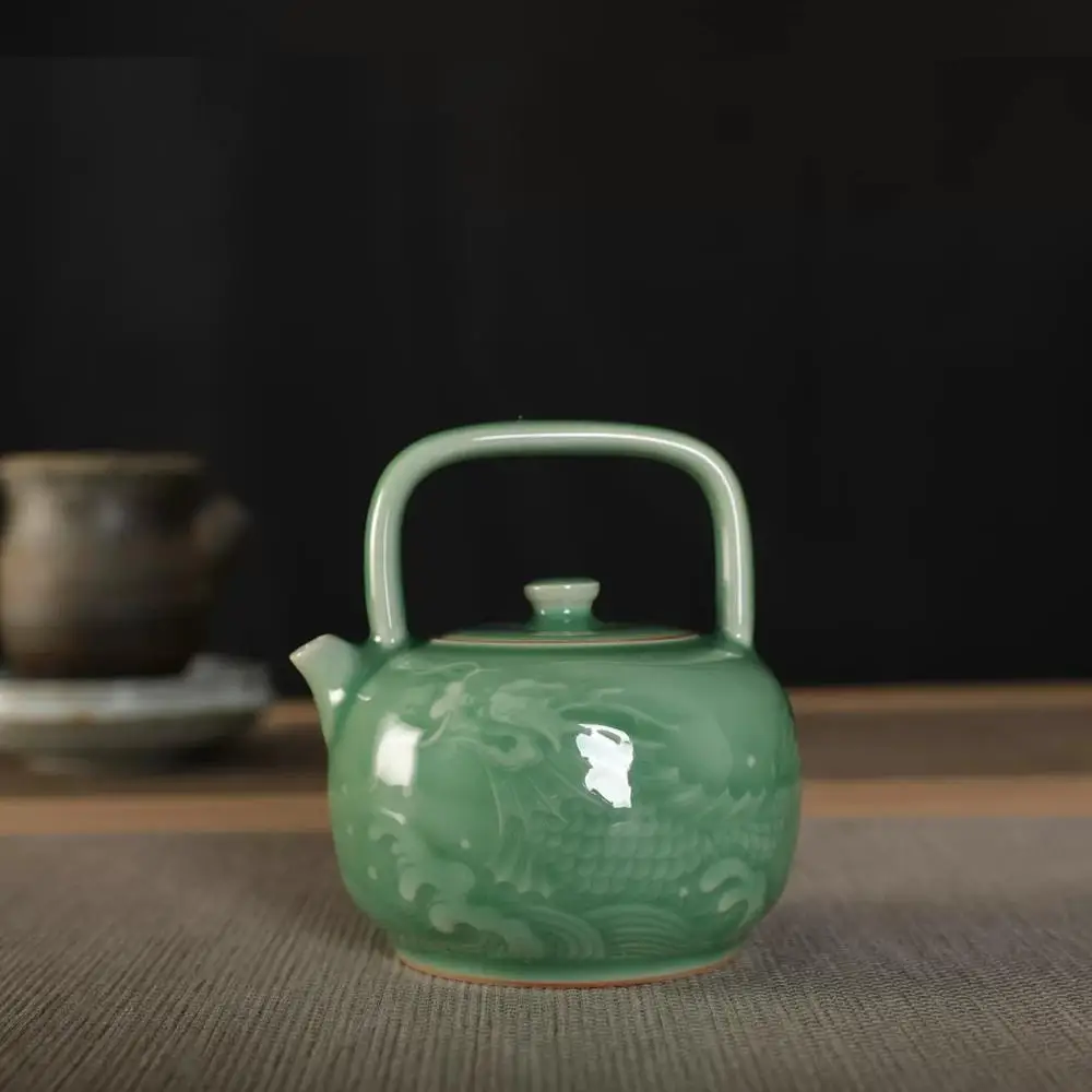 

Longquan Celadon Di Kiln Fish becoming Dragon Pattern Handle Pot Hand-carved Plum Green Pink Green Tea Pot Master Lin Min