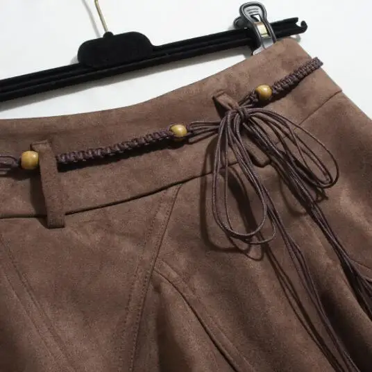 Saia de camurça retrô feminina outono e inverno nova menina cintura alta e fina versátil irregular uma palavra saia curta guarda-chuva