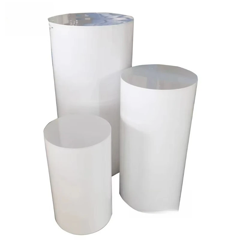 White circular column base displaying dessert cake rack, wedding pedestal table
