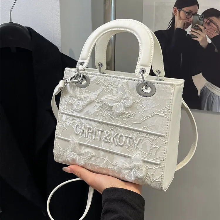 حقيبة توفي مطرزة بتصميم العلامة التجارية الفاخرة الجديدة لعام 2025، وحقيبة يد ركاب للسيدات للفصول الأربعة وحقيبة كروس