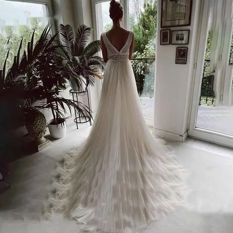 فساتين زفاف مخصصة من فيستدو دي نوفيا بوهو على الشاطئ من الدانتيل فساتين زفاف أنيقة بوهيمية من التل على شكل حرف A فستان زفاف