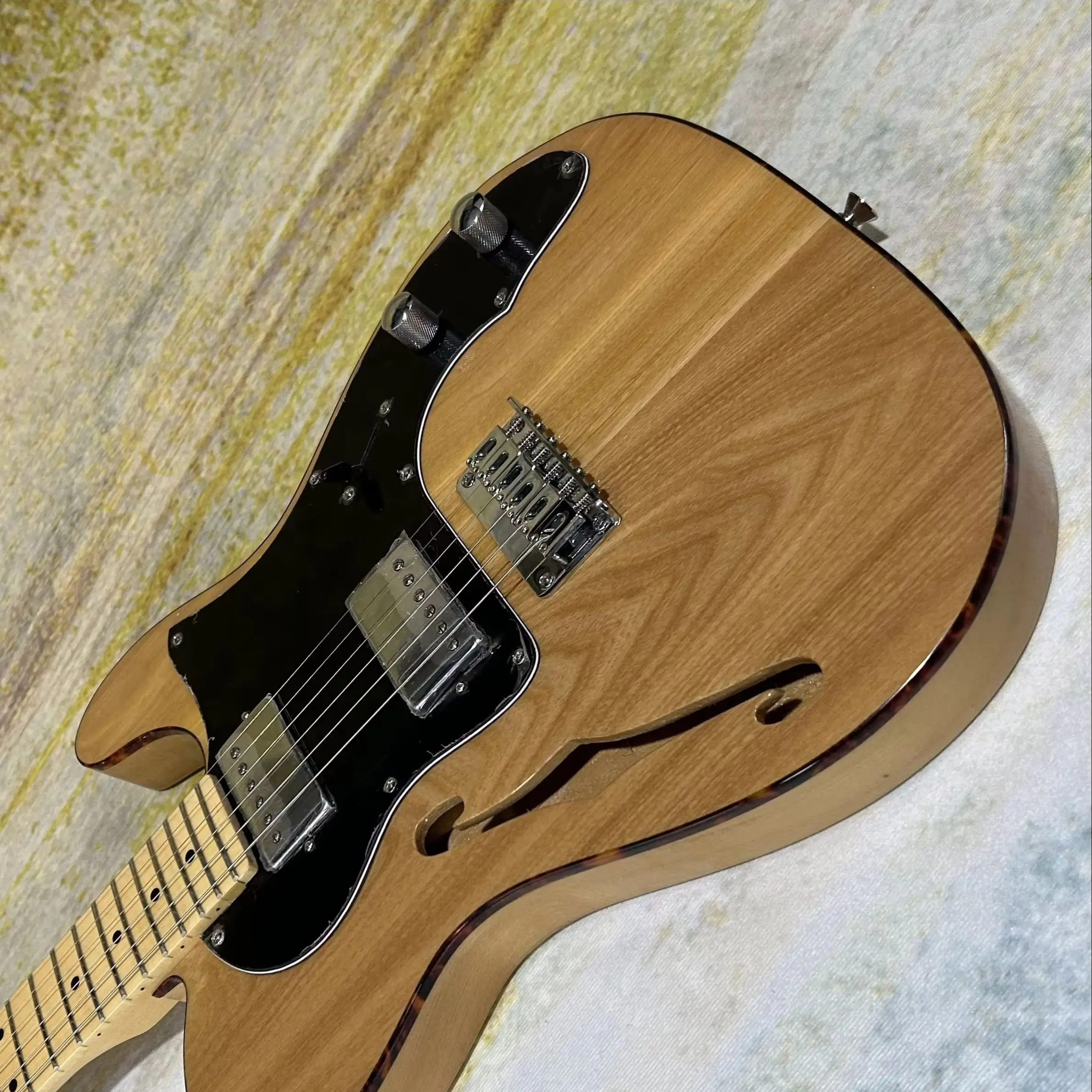 

Hot Sale Electric Guitars F Hole Maple Fretboard Natural Wood Color Ash Body
