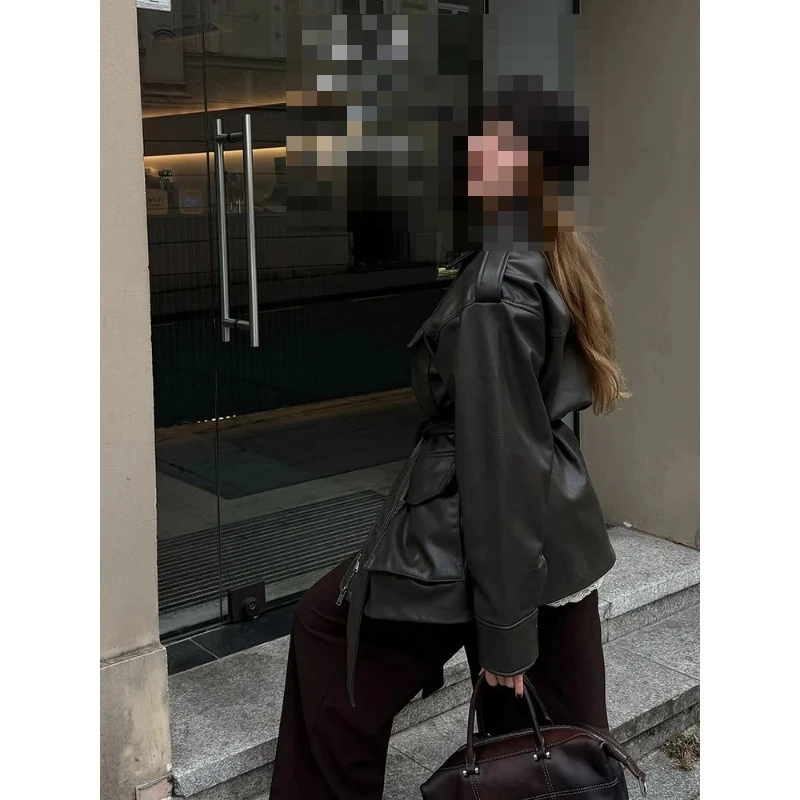 Korean version of niche versatile waist thin medium and long handsome locomotive leather jacket