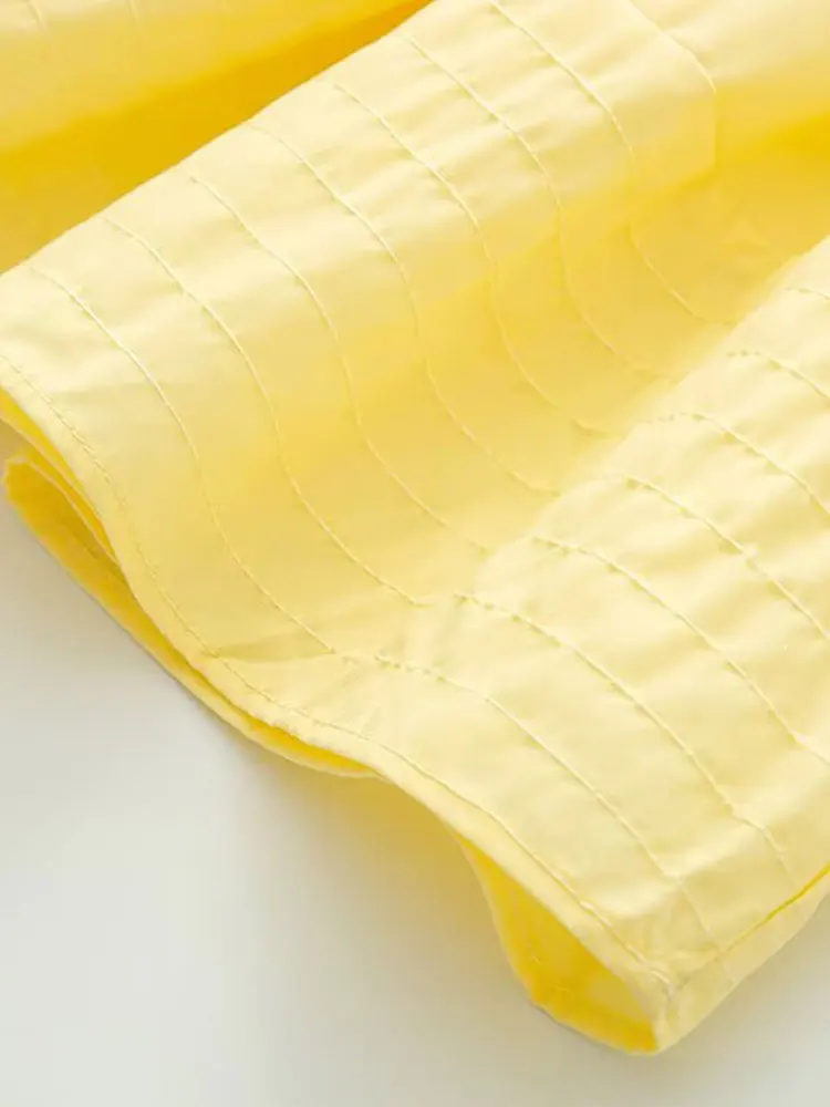 2025 Top da donna casual chic estivo Top decorativo pieghettato senza maniche con scollo a O solido Top di nuova moda