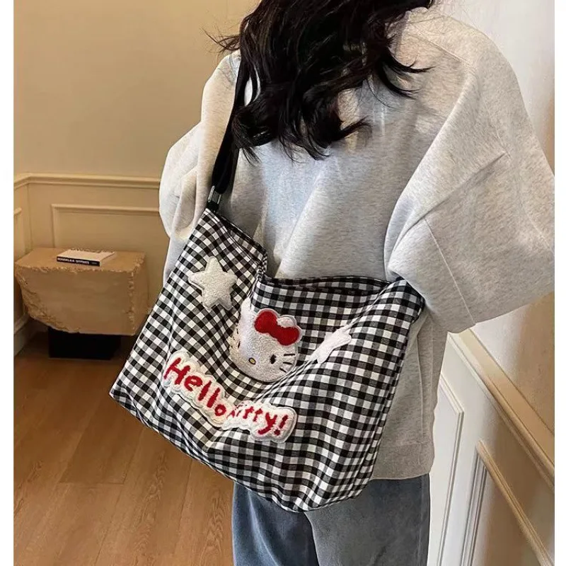 

New Sanrio Cute Hello Kitty Checkered Shoulder Bag Female Cartoon Large Capacity Crossbody Canvas Bag Student Class Commuter Bag