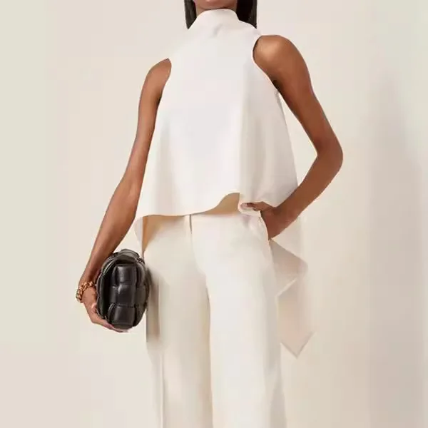 ยุโรปและสหรัฐอเมริกาฤดูใบไม้ผลิและฤดูร้อนไม่สม่ําเสมอ Hem เสื้อแขนกุดอารมณ์เสื้อเชิ้ตสีขาวผู้หญิง