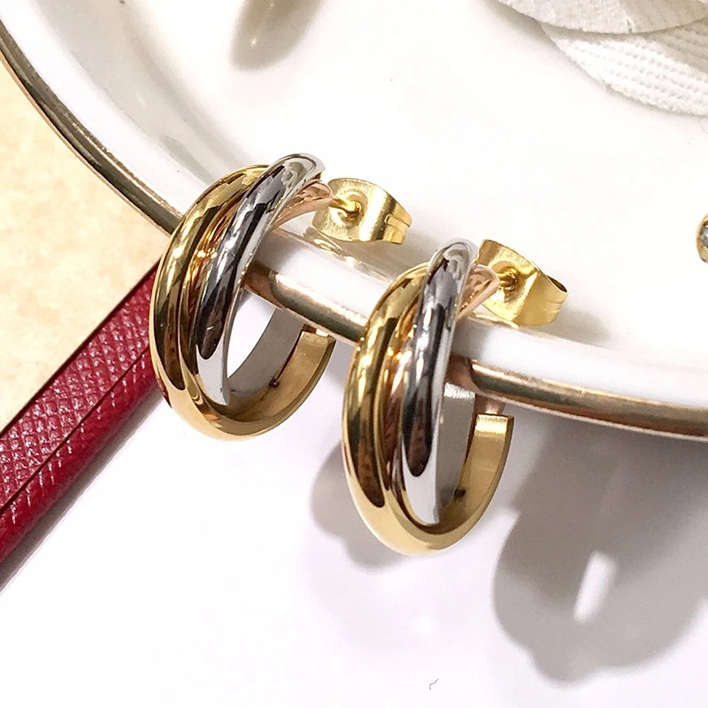 

Titanium With 18k Gold Twist Hoop Earrings Women Stainess Steel Jewelry Party T Show Gown Punk Gothic Top Runway Korean Japan