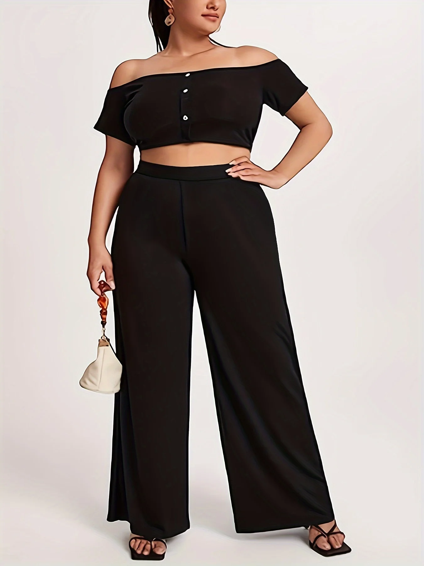 Pantaloni casual a gamba larga dal temperamento elegante in tessuto lavorato a maglia taglie forti estate 2024 da donna