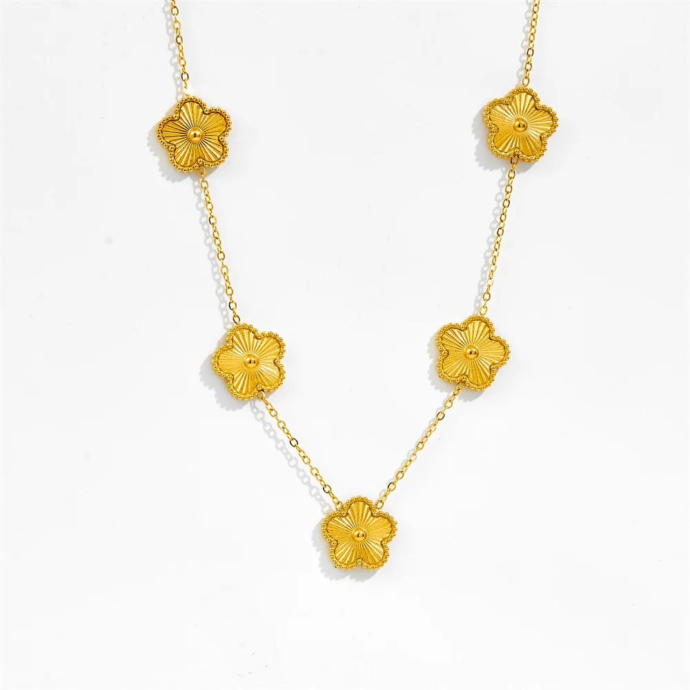 

Gold flower jewelry set