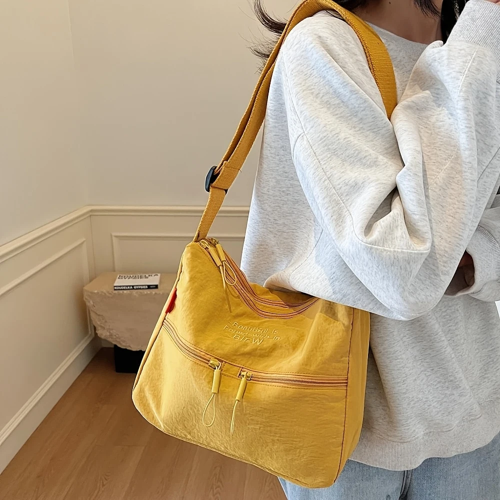 

Симпатичная ярко-желтая сумка через плечо из мытого нейлона, повседневная вместительная сумка с множеством карманов, подходящая для ежедневных поездок на работу.