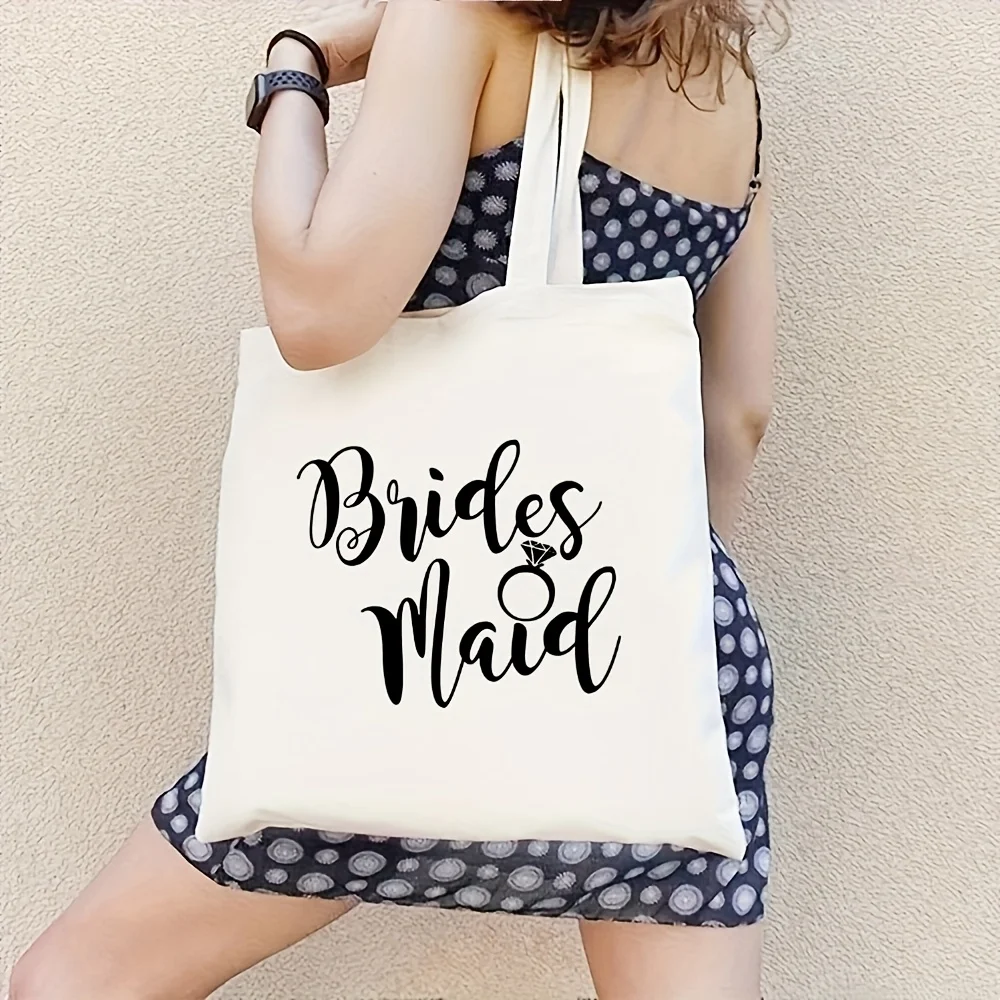 1 Piece Bridal & Bridesmaid Canvas Tote Bag - White Elegant Cursive Font, Durable Wedding Party Gift Bag, Suitable for Bridal Showers, Rehearsal Dinners, and Special Events, Stylish Letter Design, Classic Style, Sturdy Structure, Event Storage and Packaging