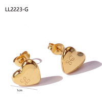 Fashionable stainless steel three-dimensional peach heart earrings, women's accessories, and jewelry