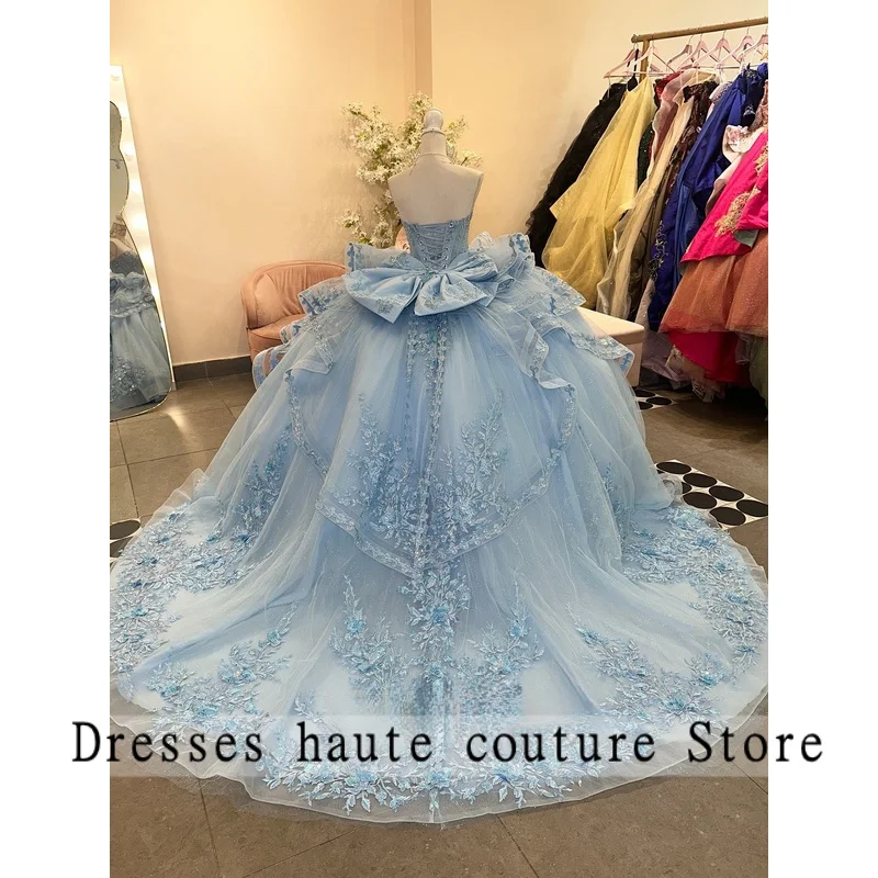ชุดเดรสสีฟ้าอ่อนสำหรับงาน Quinceañera แบบไม่มีแขน แต่งลูกไม้ผูกเชือก ผ้าทูลล์  ชุดเดรสสำหรับงาน Quinceañera ปี 2026  สามารถสั่งตัดได้