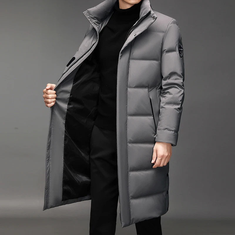 

Korean Sle Men's Winter down Jaet Long Over-Knee Stand Collar Thiened Large Size Student Faion Outerwear Coat
