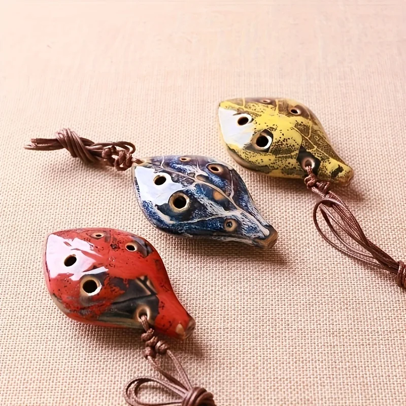 1pc, ancient Chinese style ocarina, six-hole handmade ocarina instrument, pleasant sound, with lanyard, like a leaf