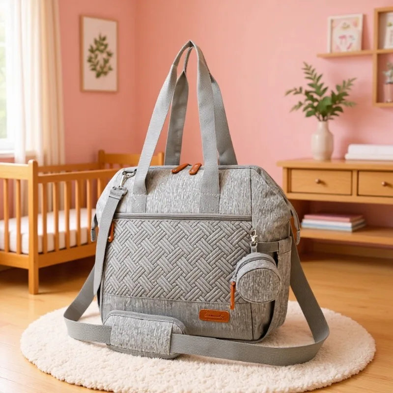 

Многофункциональная дорожная сумка для подгузников нового стиля с разделенным отделением большой вместимости и выдвижной ручкой для мам и младенцев