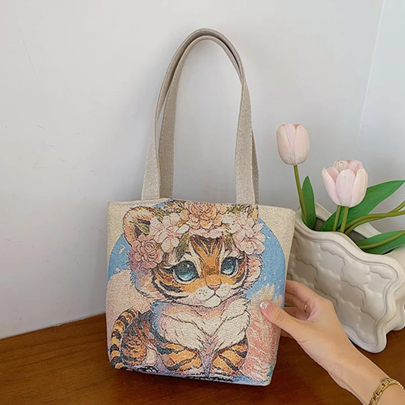 Borsa da donna portatile ricamata con filo d'oro con motivo a doppia faccia di nuova moda