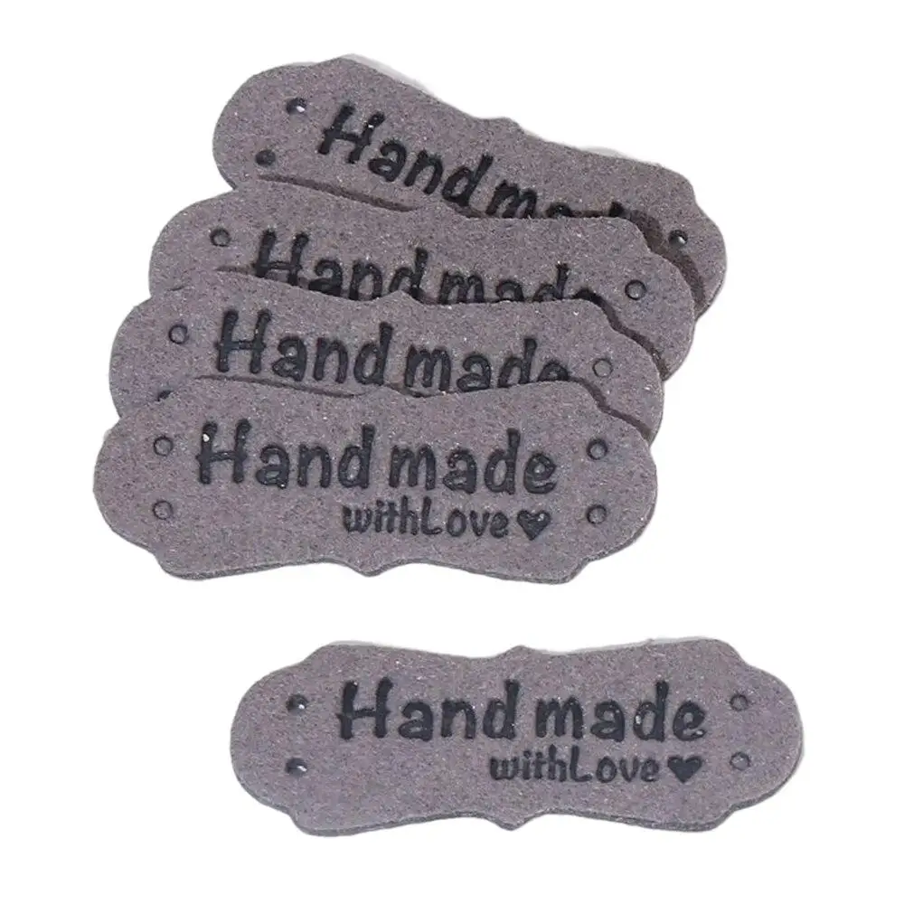 

PU Leather Handmade Labels 4x1.5cm 20PCS Clothing Embossed Tag Labels Knitting DIY Garment Sewing Accessories Jeans Bags Hat