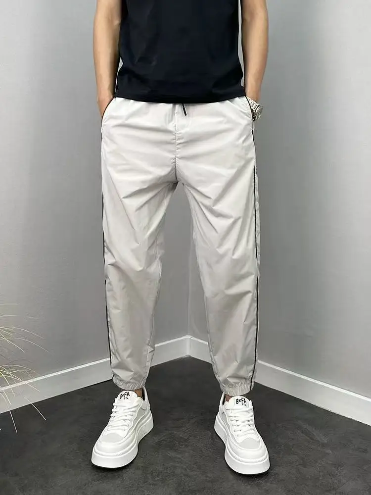 

Новые мужские повседневные брюки с цветной вышивкой и буквами, свободные летние дышащие брюки с манжетами, молодежная мода