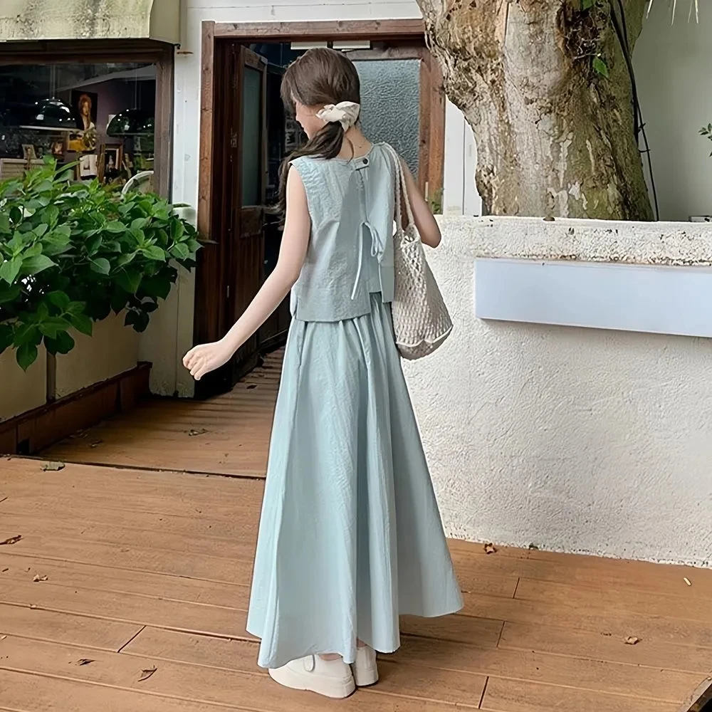 

Женский модный комплект: жилет, блузка без рукавов, юбка миди А-силуэта, элегантная юбка-полусолнце, комплект из трех предметов, лето 2025, середина года