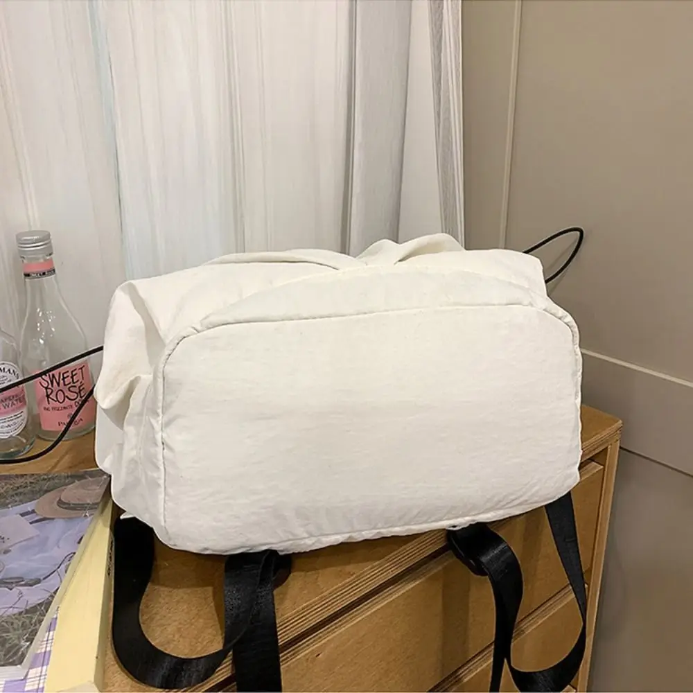 حقيبة ظهر رياضية من النايلون صغيرة بلون سادة على الطراز الكوري حقيبة كتف بلون سادة بجيوب متعددة حقيبة ظهر رياضية كاجوال للنساء