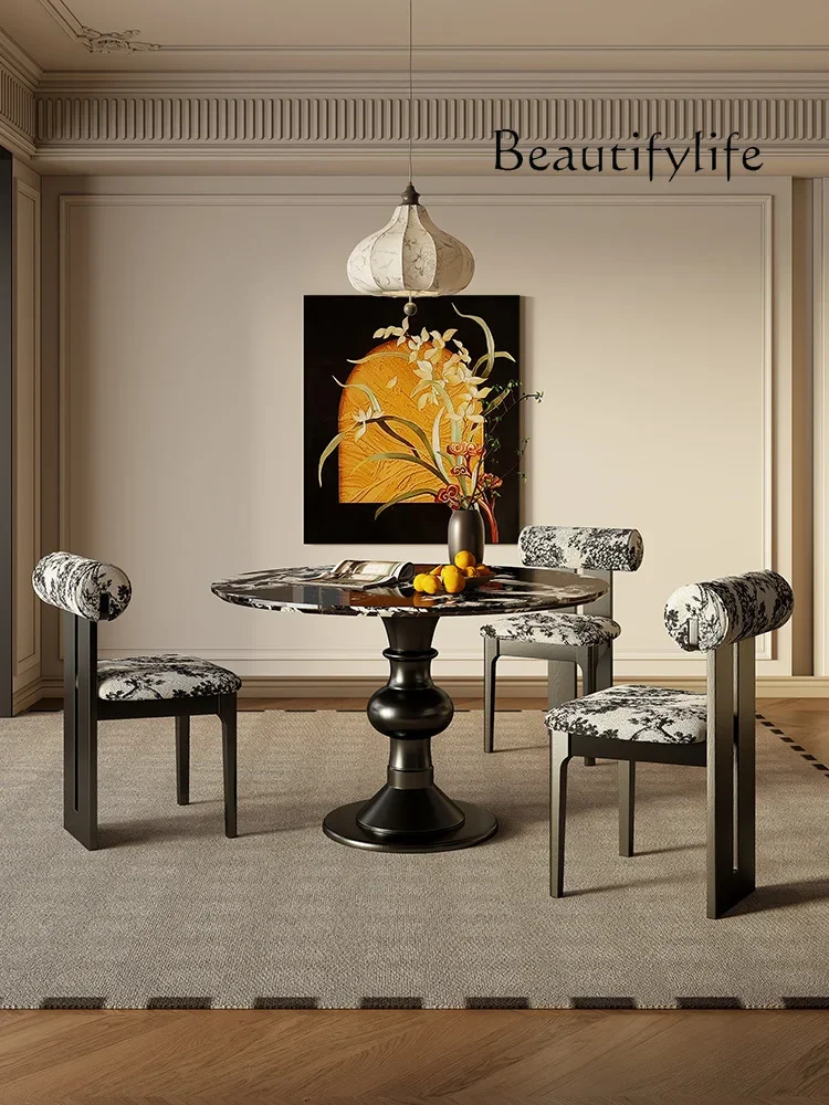 

French black natural luxury stone marble dining table and chairs high-end household solid wood round table combination